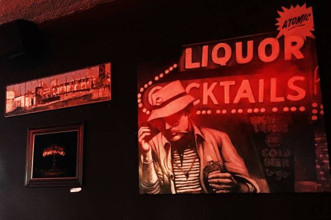 The walls of Atomic Liquor are covered in Las Vegas-themed art, including artwork of Hunter S. ...