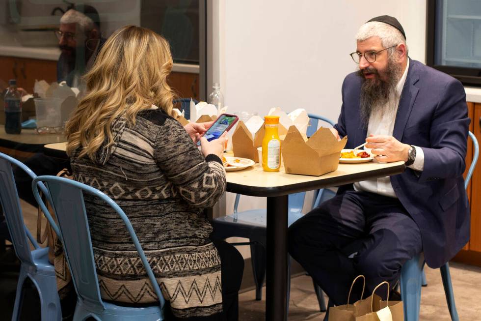 Chaya Harlig, left, and Rabbi Mendy Harlig enjoy a meal at Kosher Chinglish. (Ellen Schmidt/Las ...