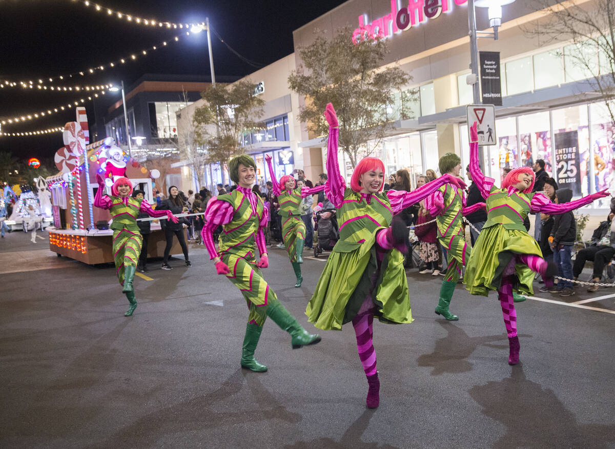 Dancers perform during the Downtown Summerlin Holiday Parade on Festival Plaza Drive on Friday, ...