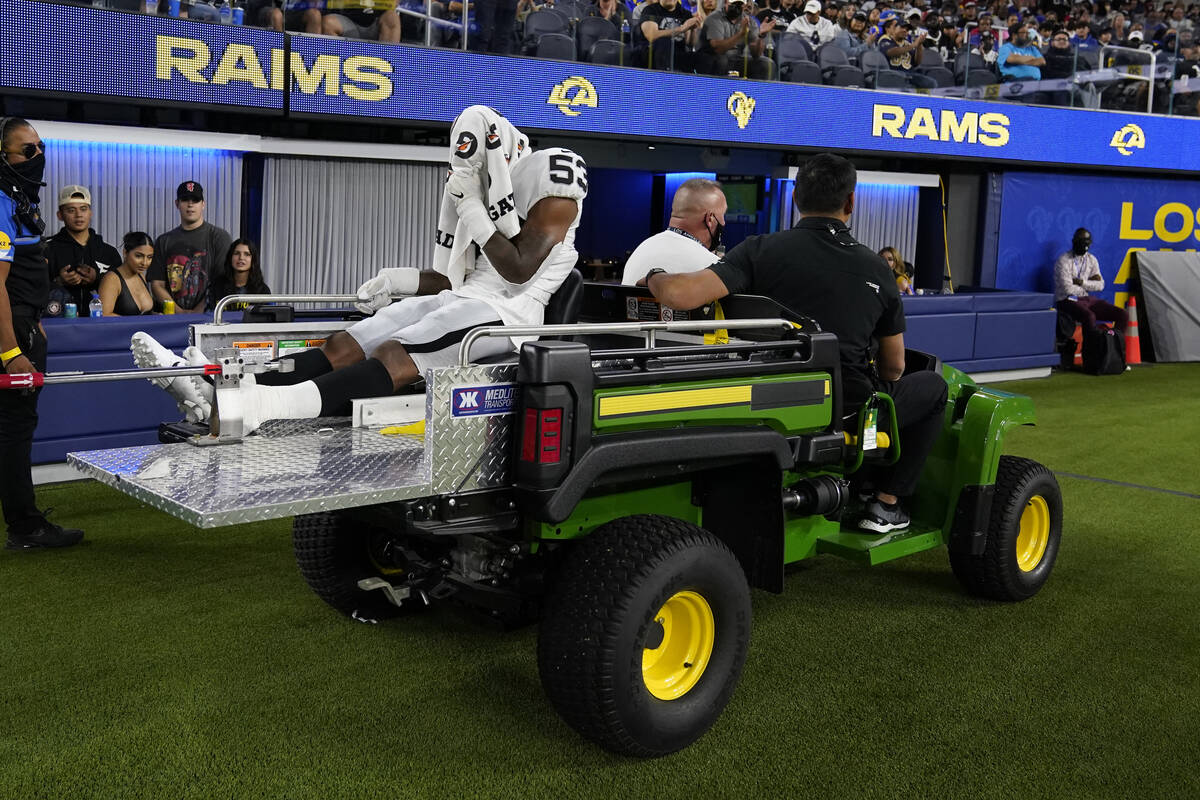 Las Vegas Raiders linebacker Javin White (53) is carted off the field after an injury during th ...