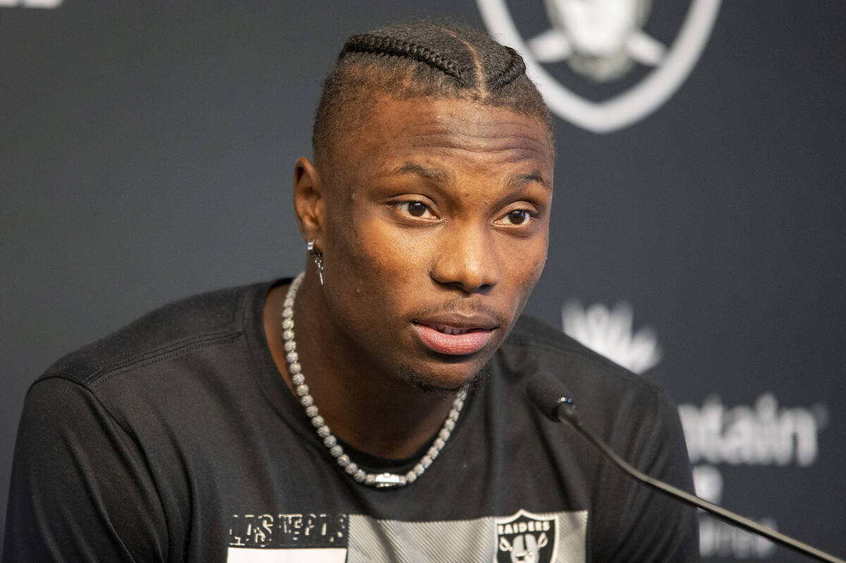 Raiders wide receiver Henry Ruggs III answers questions during a news conference at the Raiders ...
