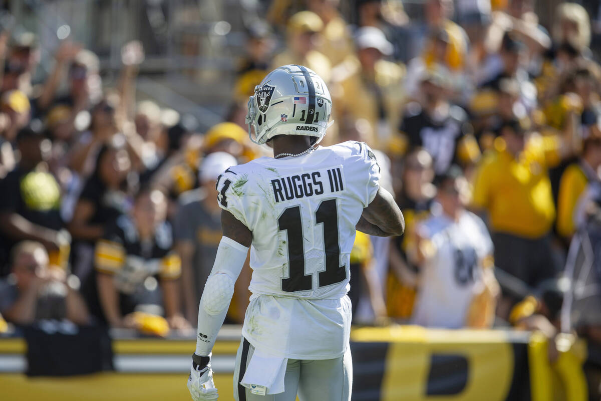 Raiders wide receiver Henry Ruggs III (11) runs into the end zone for a 61-yard touchdown durin ...