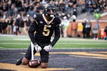 Wake Forest wide receiver Jaquarii Roberson (5) celebrates scoring a touchdown during the first ...