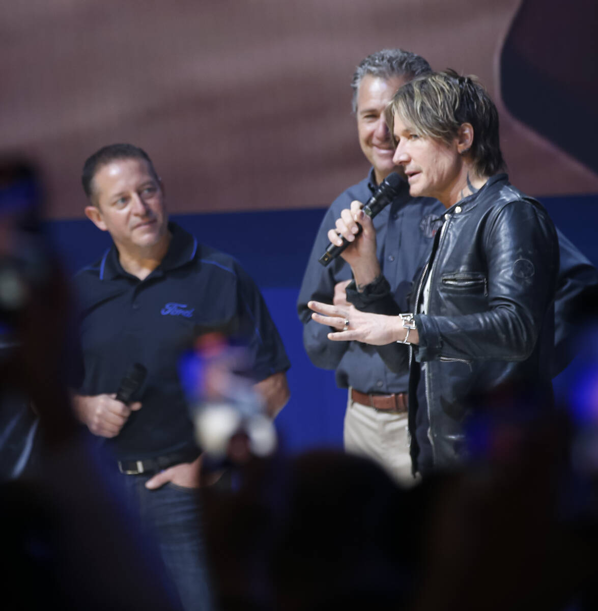 Country music star Keith Urban speaks before the unveiling of his renovated 1969 Ford Mustang d ...