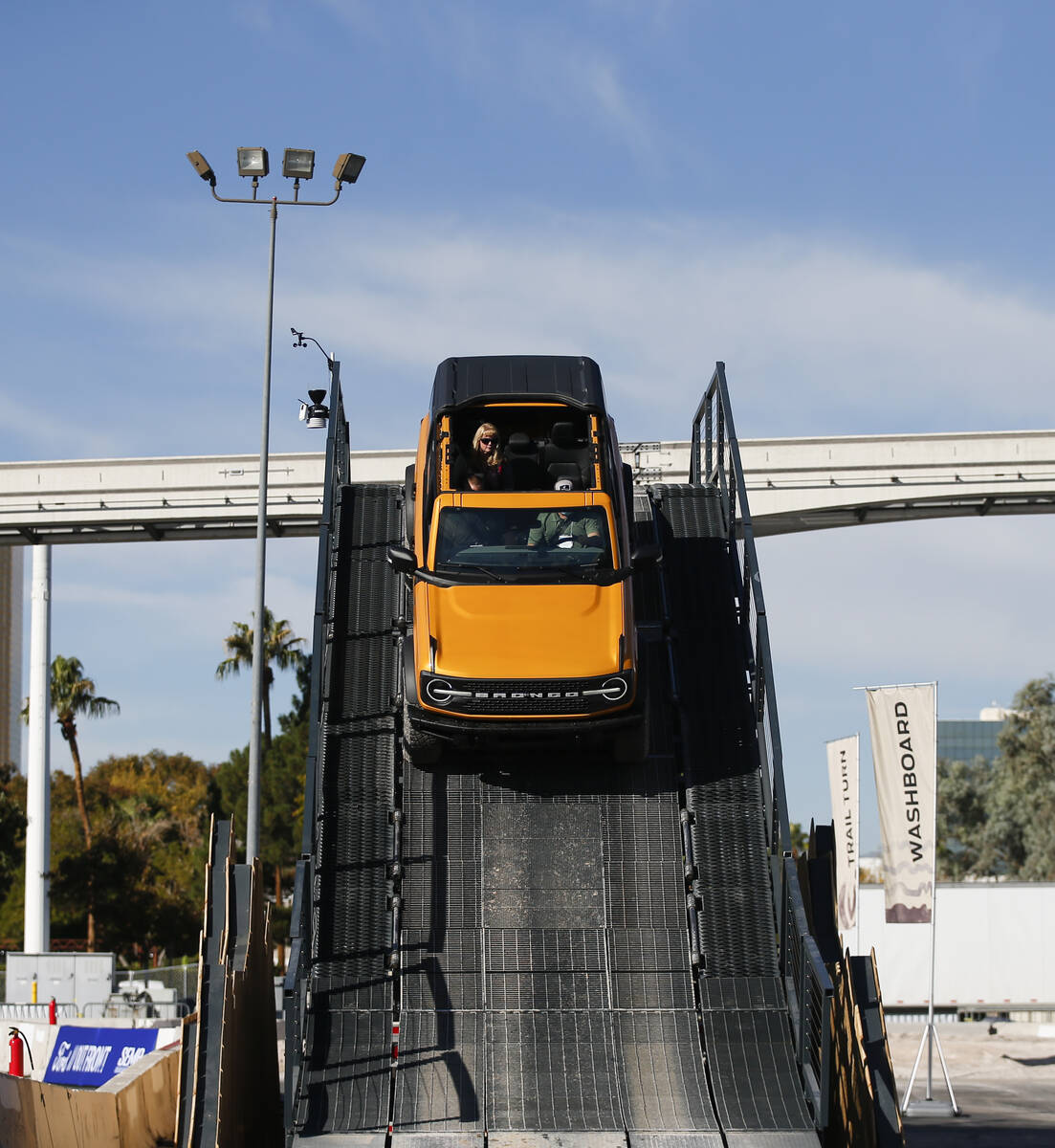 Attendees test drive a Ford Bronco during the Specialty Equipment Market Association, or SEMA, ...