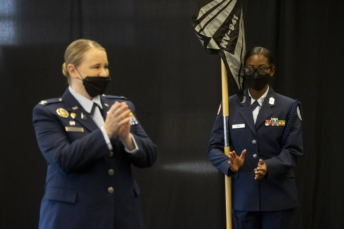 Col. Niki Lindhorst, left, and Chief Master Sgt. D'Simber Dart applaud following the NV-941 Spa ...