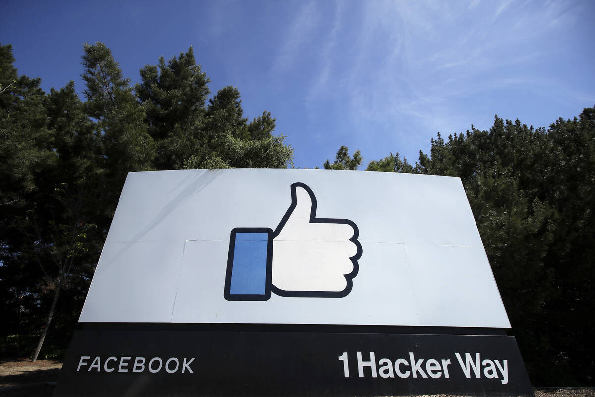 The thumbs up Like logo is shown on a sign at Facebook headquarters in Menlo Park, Calif., on A ...