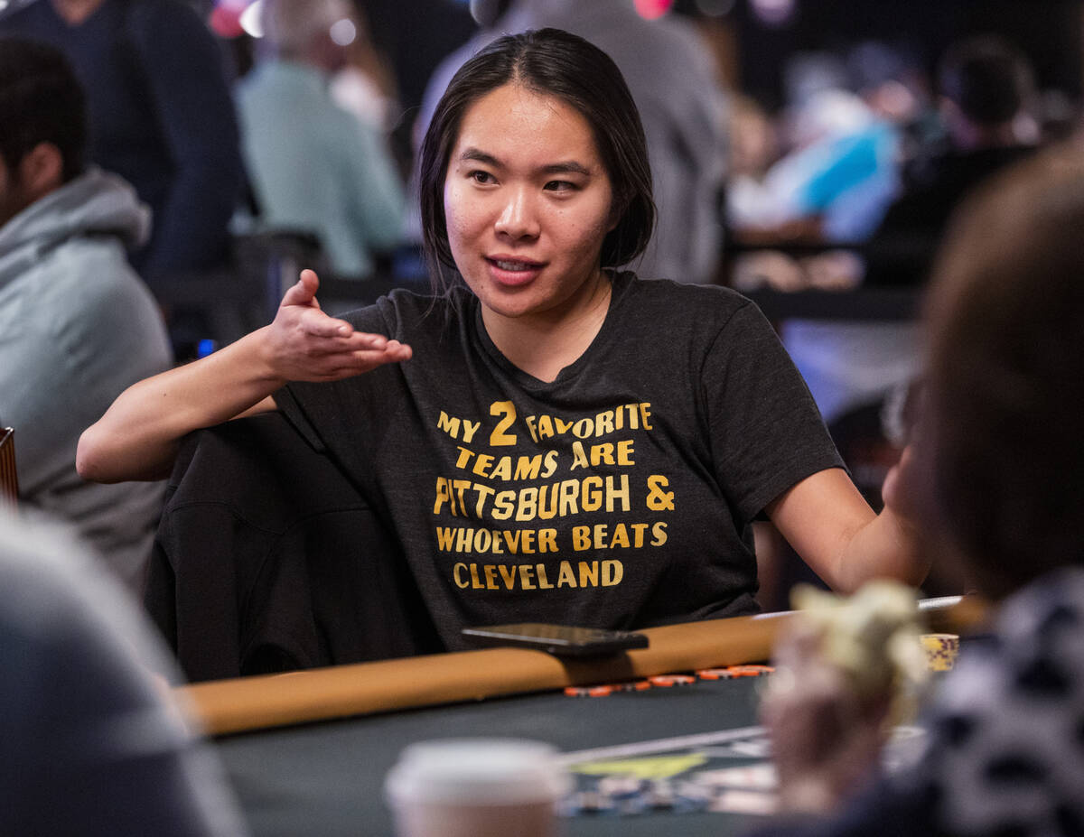 Lynne Ji of Los Angeles chats with other players at her table during Day 1A of the $10,000 buy- ...