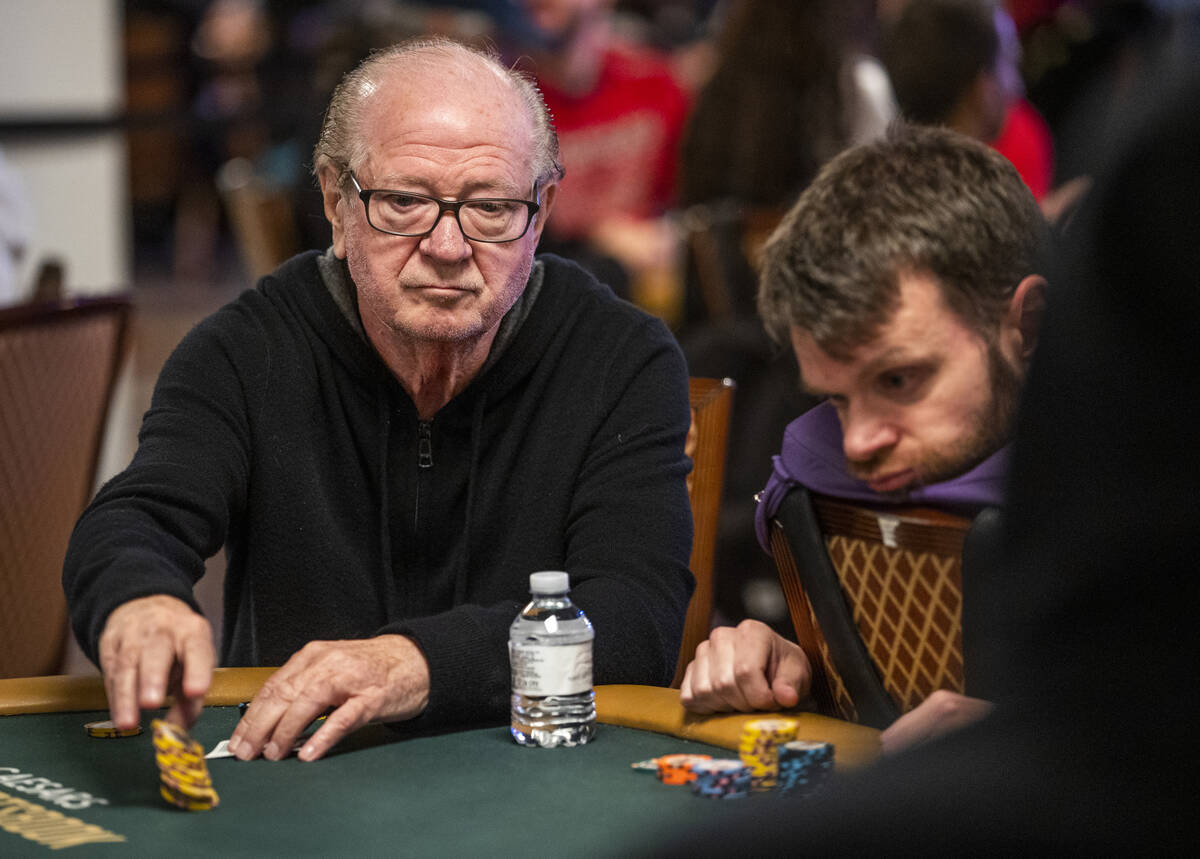 Billy Baxter throws chips into the pot during Day 1A of the $10,000 buy-in Main Event at the Wo ...