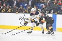 Buffalo Sabres center Jack Eichel (9) and Vegas Golden Knights center Jonathan Marchessault (81 ...