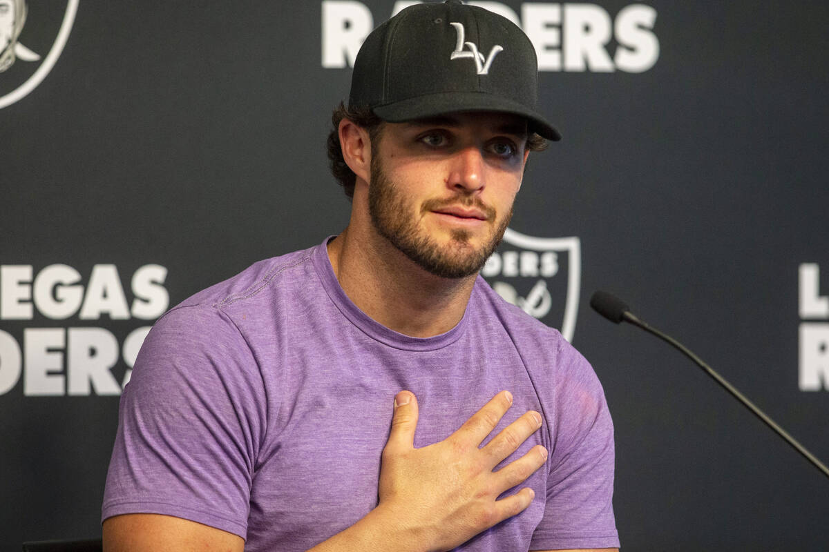 Raiders quarterback Derek Carr speaks to media about former teammate Henry Ruggs, not pictured, ...
