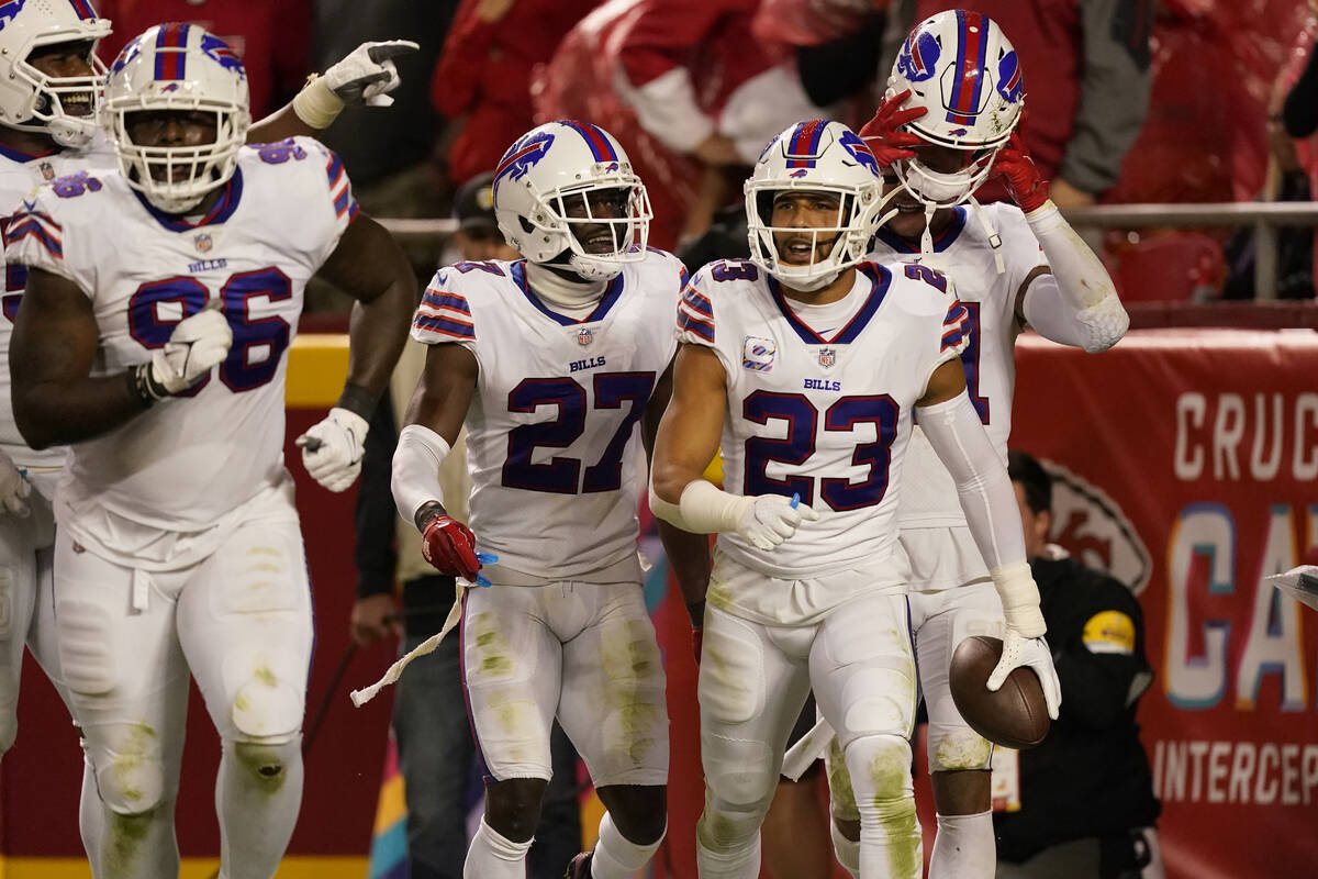 Buffalo Bills safety Micah Hyde (23) is congratulated by teammates after running an interceptio ...