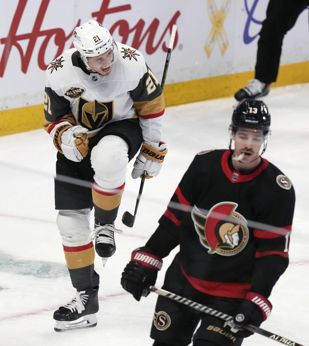 Vegas Golden Knights centre Brett Howden celebrates his goal as Ottawa Senators left wing Zach ...