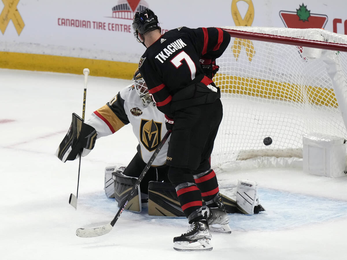 Ottawa Senators left wing Brady Tkachuk tips the puck past Vegas Golden Knights goaltender Robi ...