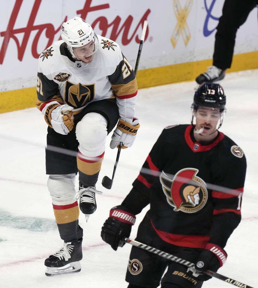 Vegas Golden Knights center Brett Howden celebrates his goal as Ottawa Senators left wing Zach ...
