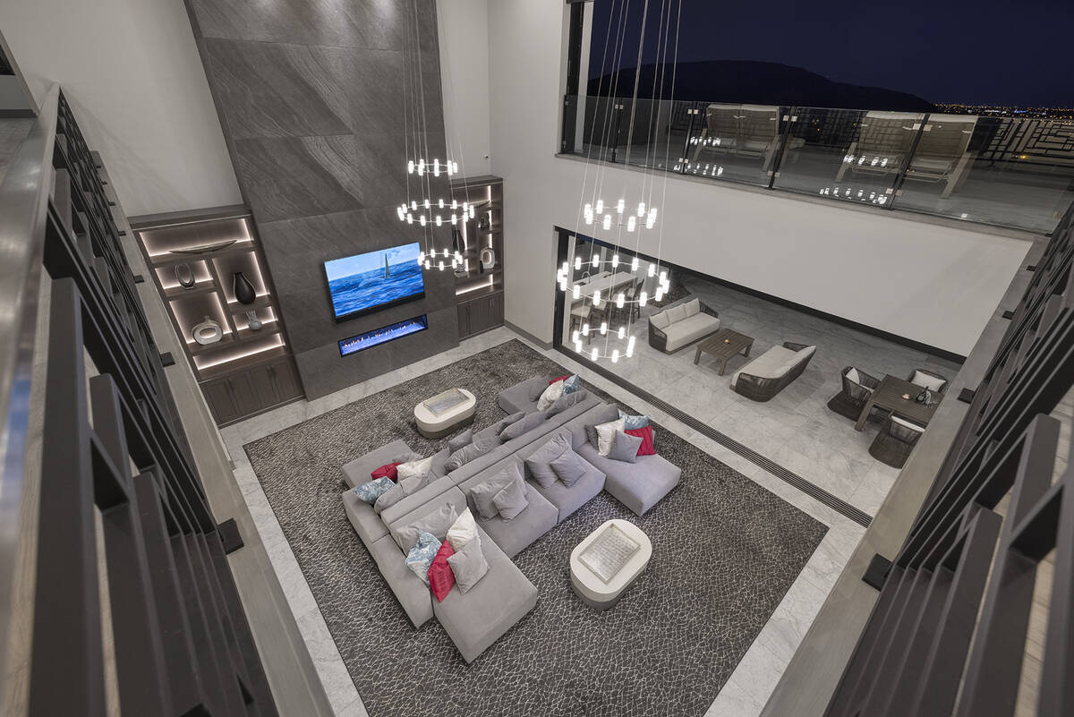 The living room is two stories. (Las Vegas Sotheby’s International Realty)