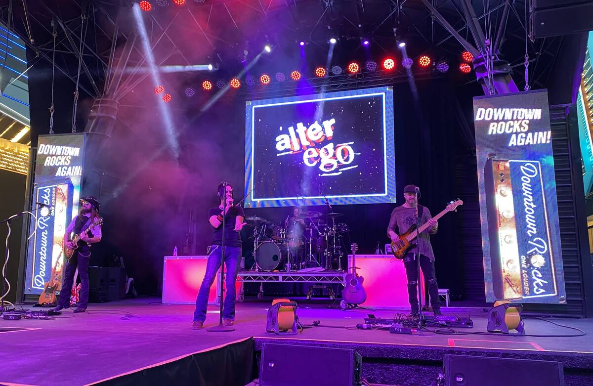 Rock cover band Alter Ego performs on the Fremont Street Experience's 1st Street Stage early mo ...