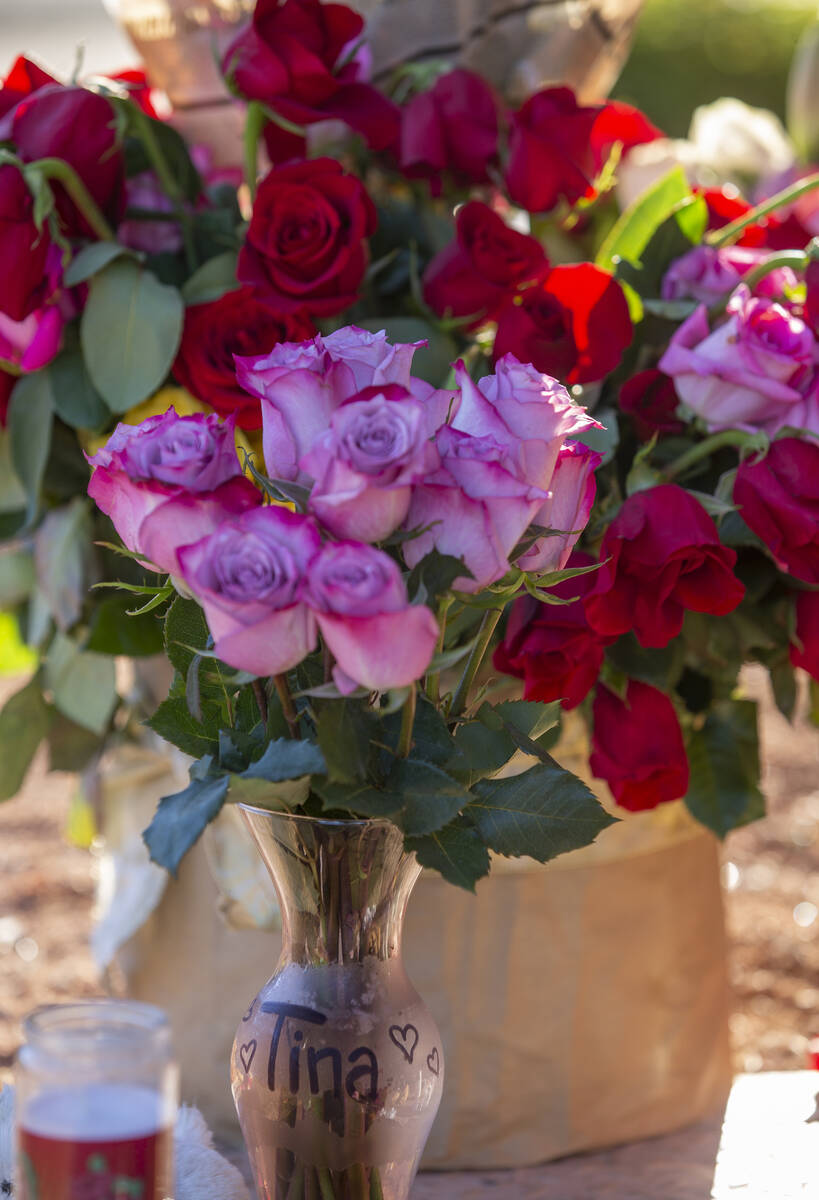 Flowers for Tina Tintor at a roadside memorial on Thursday, Nov. 4, 2021, near the site where s ...