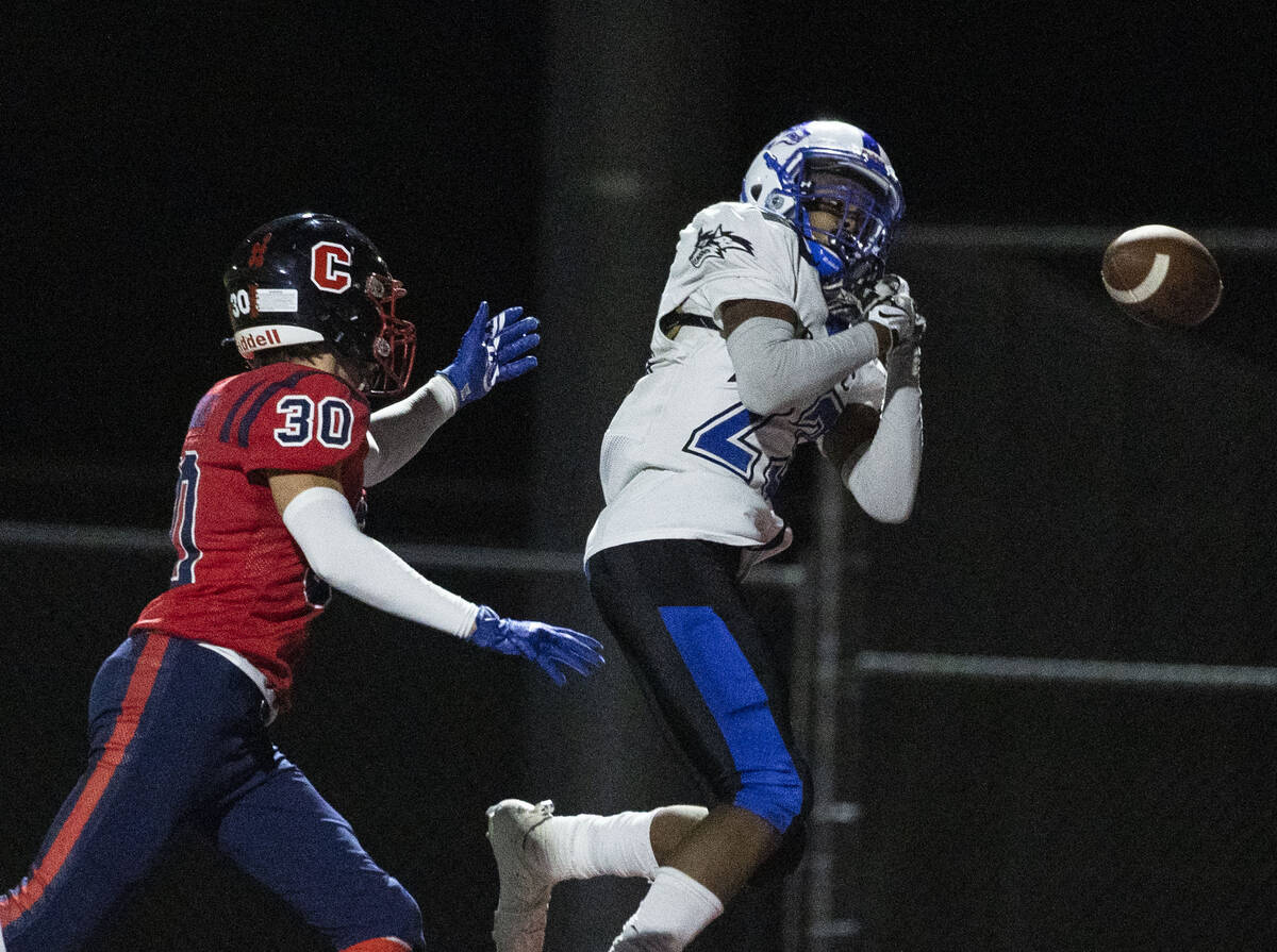 Basic wide receiver Zuri Whiters (23) tries but unable to catch the pass as Coronado High cente ...