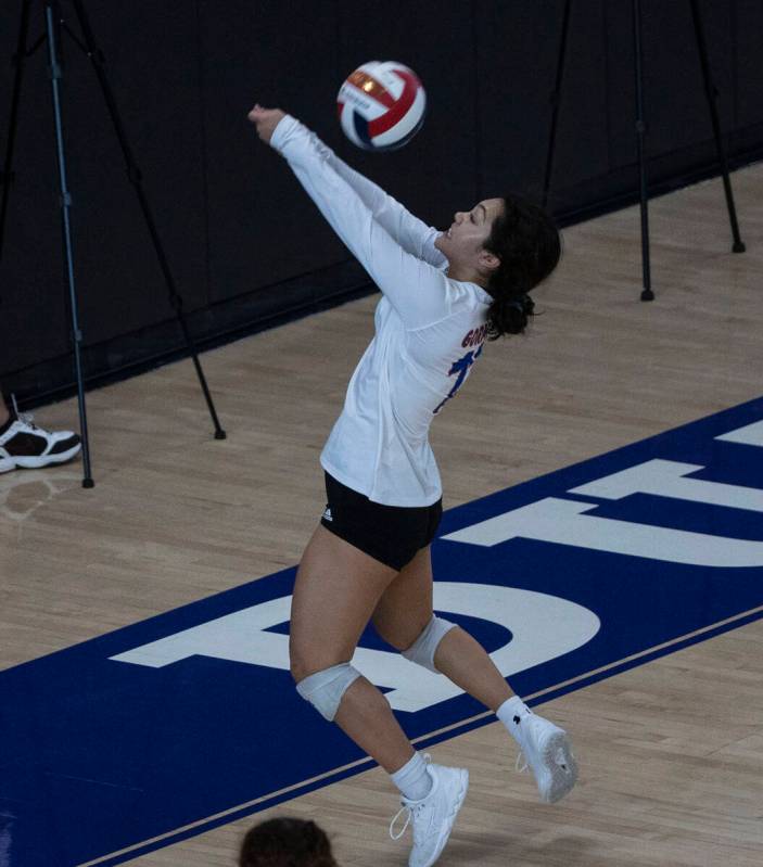Bisho Gorman's Tatum Thompson (13) bumps to Centennial High School during the class 4A state vo ...