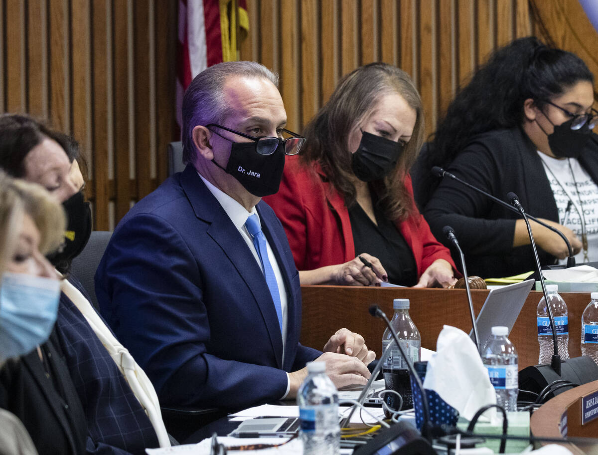 Clark County School District Board of Trustees President Linda Cavazos second right, and Superi ...