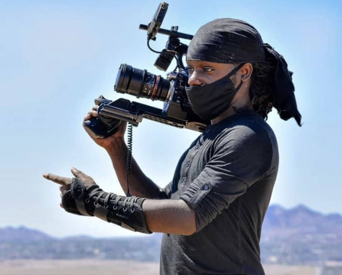 This undated photo provided by a friend shows Curtis Abraham, 36, during a movie set in Las Veg ...
