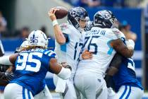 Tennessee Titans quarterback Ryan Tannehill (17) is sacked by Indianapolis Colts defensive tack ...