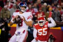 New York Giants quarterback Daniel Jones (8) drops back to pass as Kansas City Chiefs defensive ...