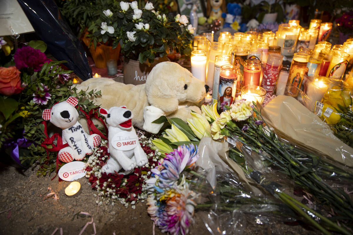 A memorial for Tina Tintor and her dog Max on Rainbow Boulevard and Spring Valley Parkway is se ...