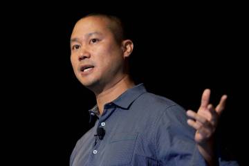 Tony Hsieh speaks during a Grand Rapids Economic Club luncheon in Grand Rapids, Mich., in 2013. ...