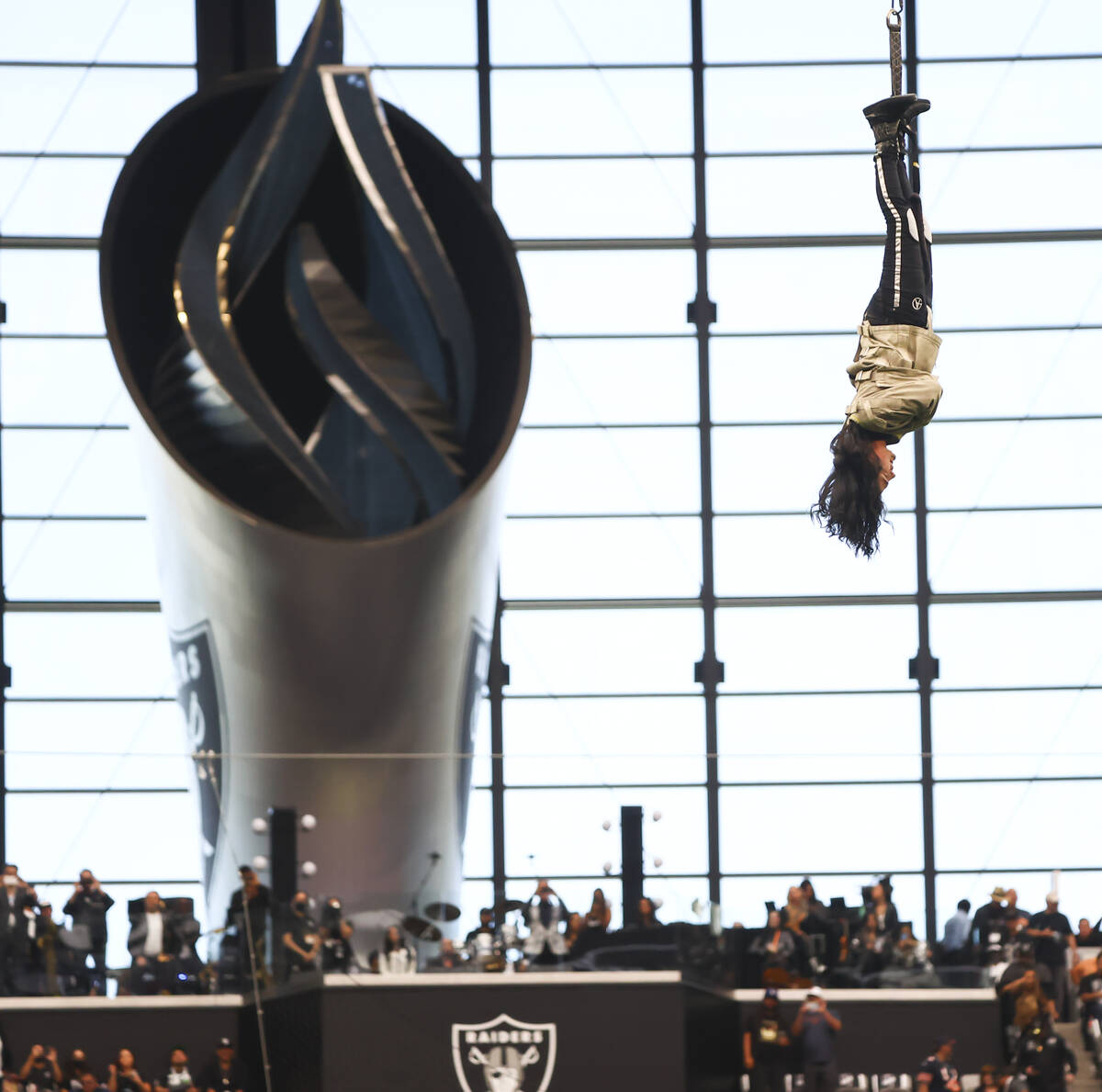 Magician and "Mindfreak" star Criss Angel is raised before dangling over 100 feet in ...