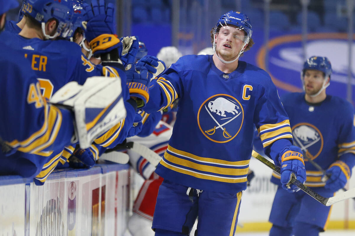 FILE - Buffalo Sabres forward Jack Eichel (9) celebrates his goal during the first period of an ...