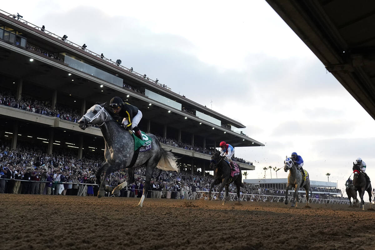 Joel Rosario rides Knicks Go, left, to victory during the Breeders' Cup Classic race at the Del ...