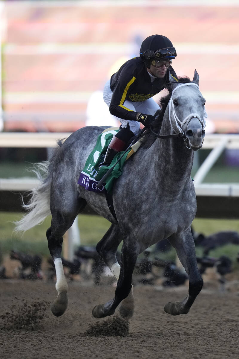 Joel Rosario rides Knicks Go to victory during the Breeders' Cup Classic race at the Del Mar ra ...