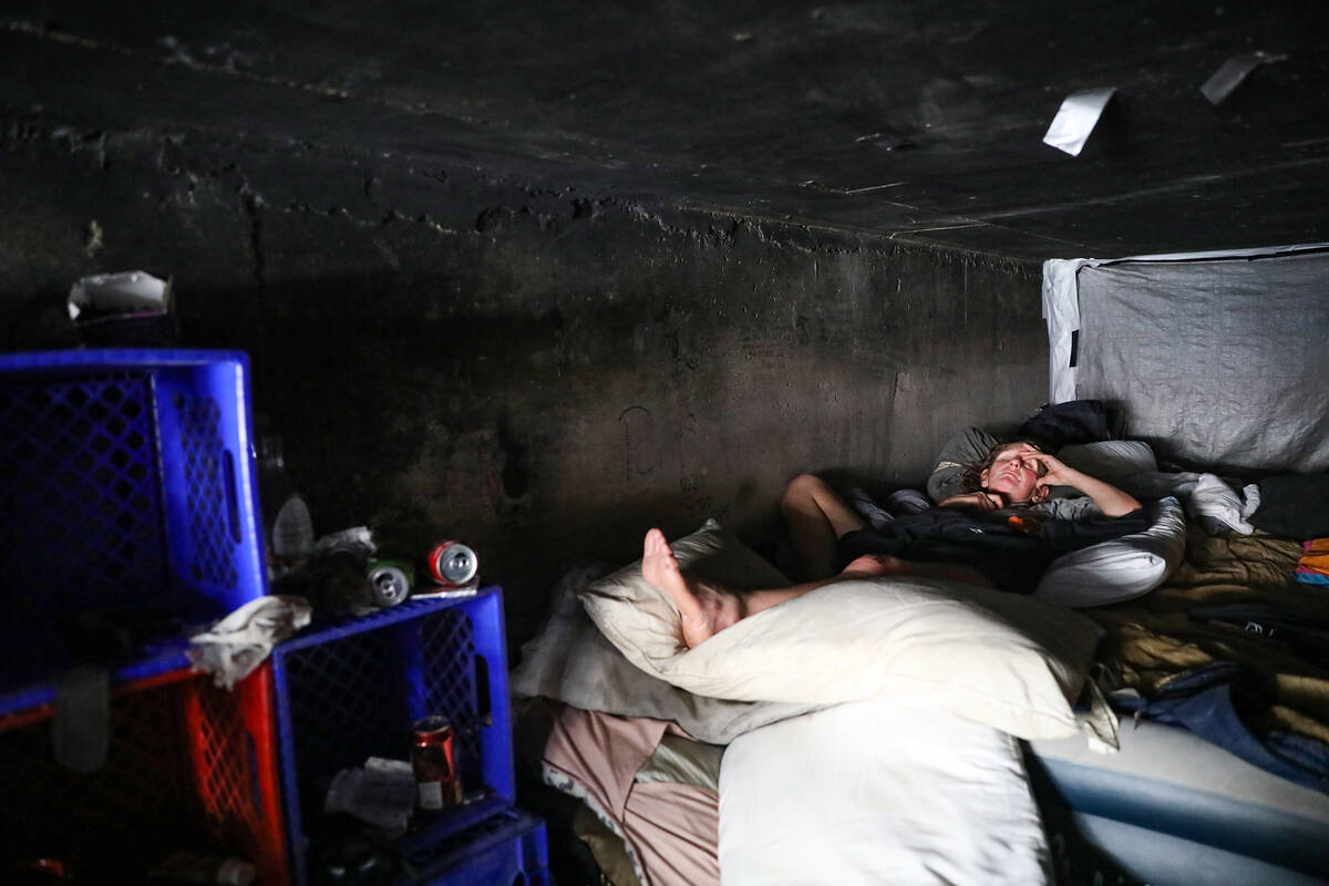 Leah, who has an injured leg, talks to reporters in one of the flood tunnels beneath the city i ...