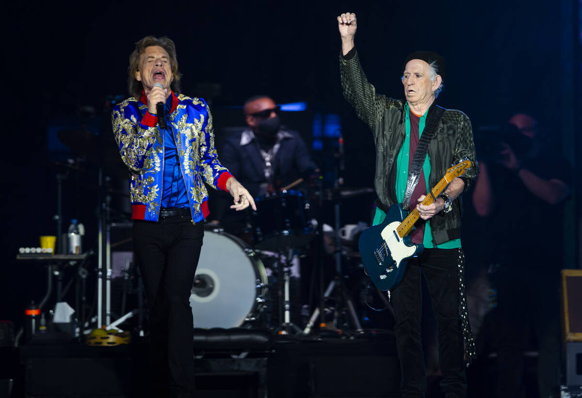 Mick Jagger, left, and Keith Richards of The Rolling Stones perform at Allegiant Stadium in Las ...
