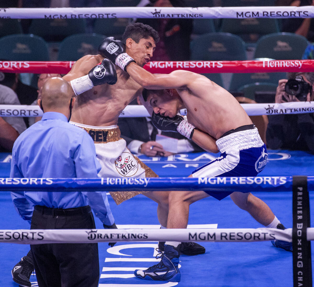Rey Vargas, left, battles with Leonardo Baez in round 1 during their super bantamweight fight a ...