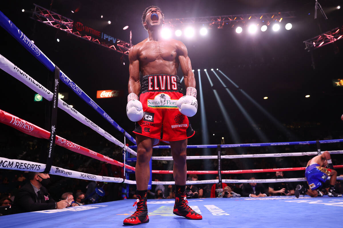 Elvis Rodriguez reacts after his knockout win against Juan Pablo Romero in the fifth round of a ...