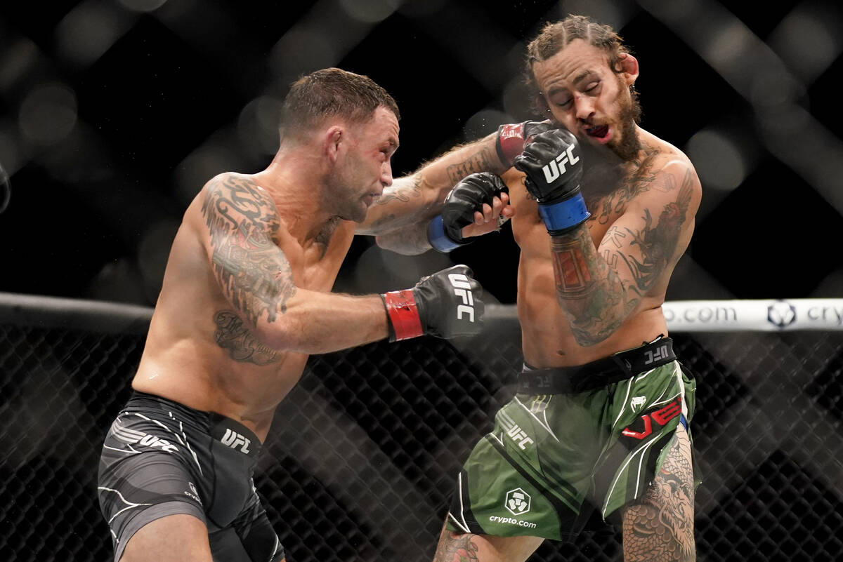 Frankie Edgar lands a punch against Marlon Vera during a bantamweight mixed martial arts bout a ...