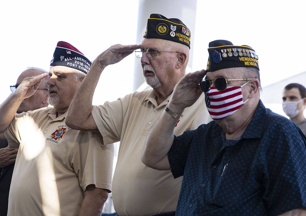 U.S. Air Force veterans Bob Zentz, 66, left, Bob Reynierse, 83, and Bill McNeill, 79, right, sa ...