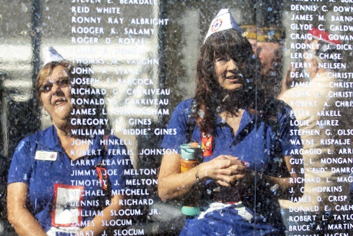 Blue Star Mothers Brenda Ralston, left, and Rachael Nordlinder, both of Henderson, are reflecte ...