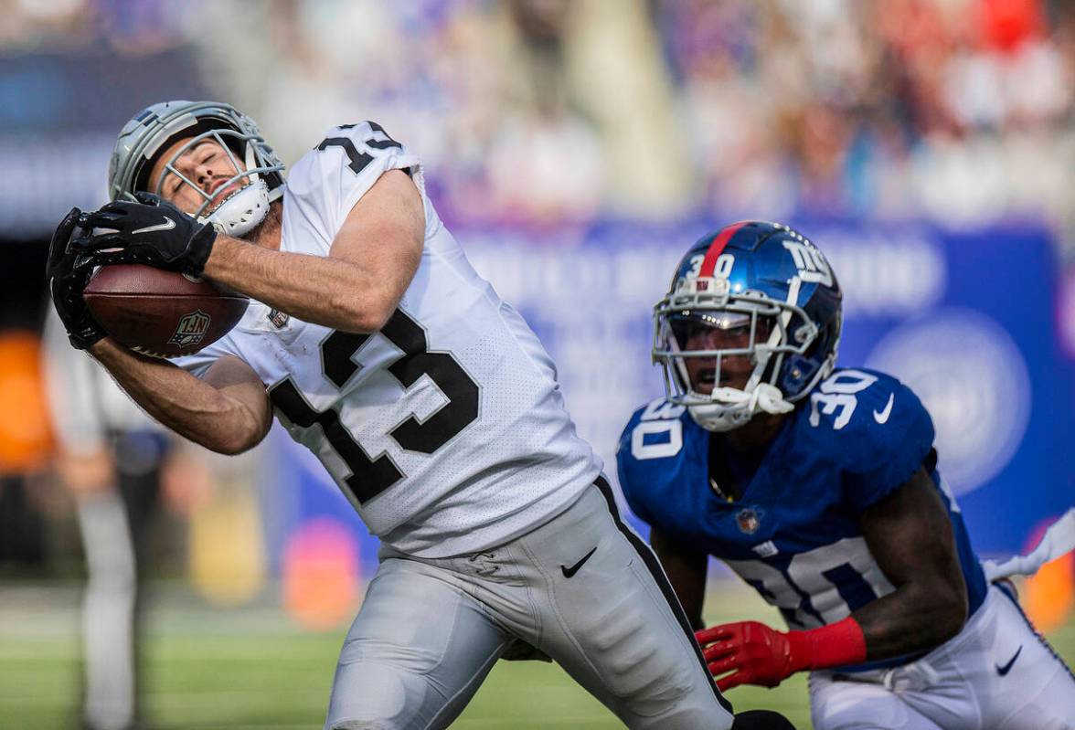 Las Vegas Raiders wide receiver Hunter Renfrow (13) makes a catch down the sideline past New Yo ...
