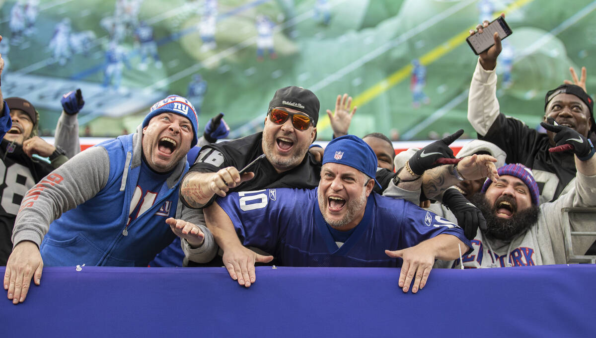 New York Giants and Raiders fans during an NFL football game on Sunday, Nov. 7, 2021, at MetLif ...
