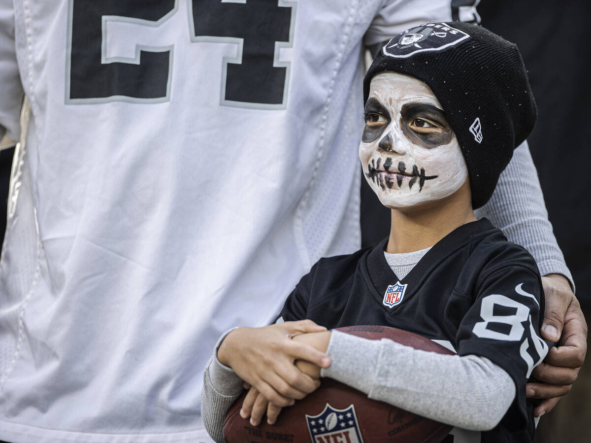 Raiders fans during an NFL football game against the New York Giants on Sunday, Nov. 7, 2021, a ...
