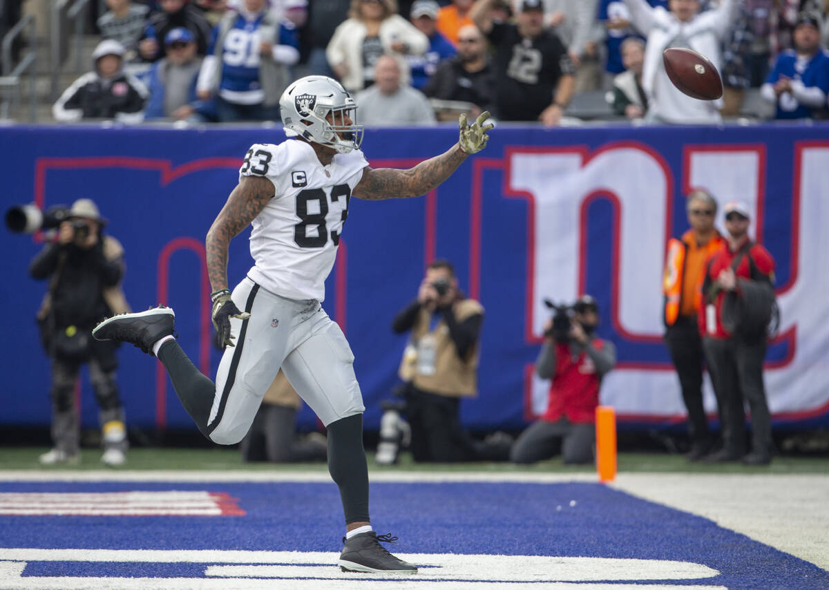 Las Vegas Raiders tight end Darren Waller (83) is overthrown in the end zone during the second ...