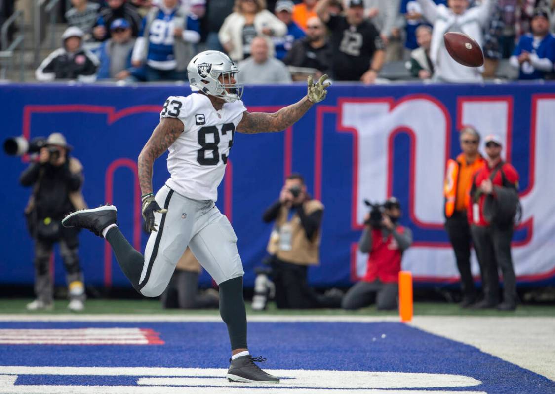 Las Vegas Raiders tight end Darren Waller (83) is overthrown in the end zone during the second ...