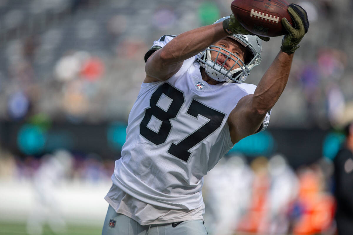 Las Vegas Raiders tight end Foster Moreau (87) makes a catch during drills before an NFL footba ...