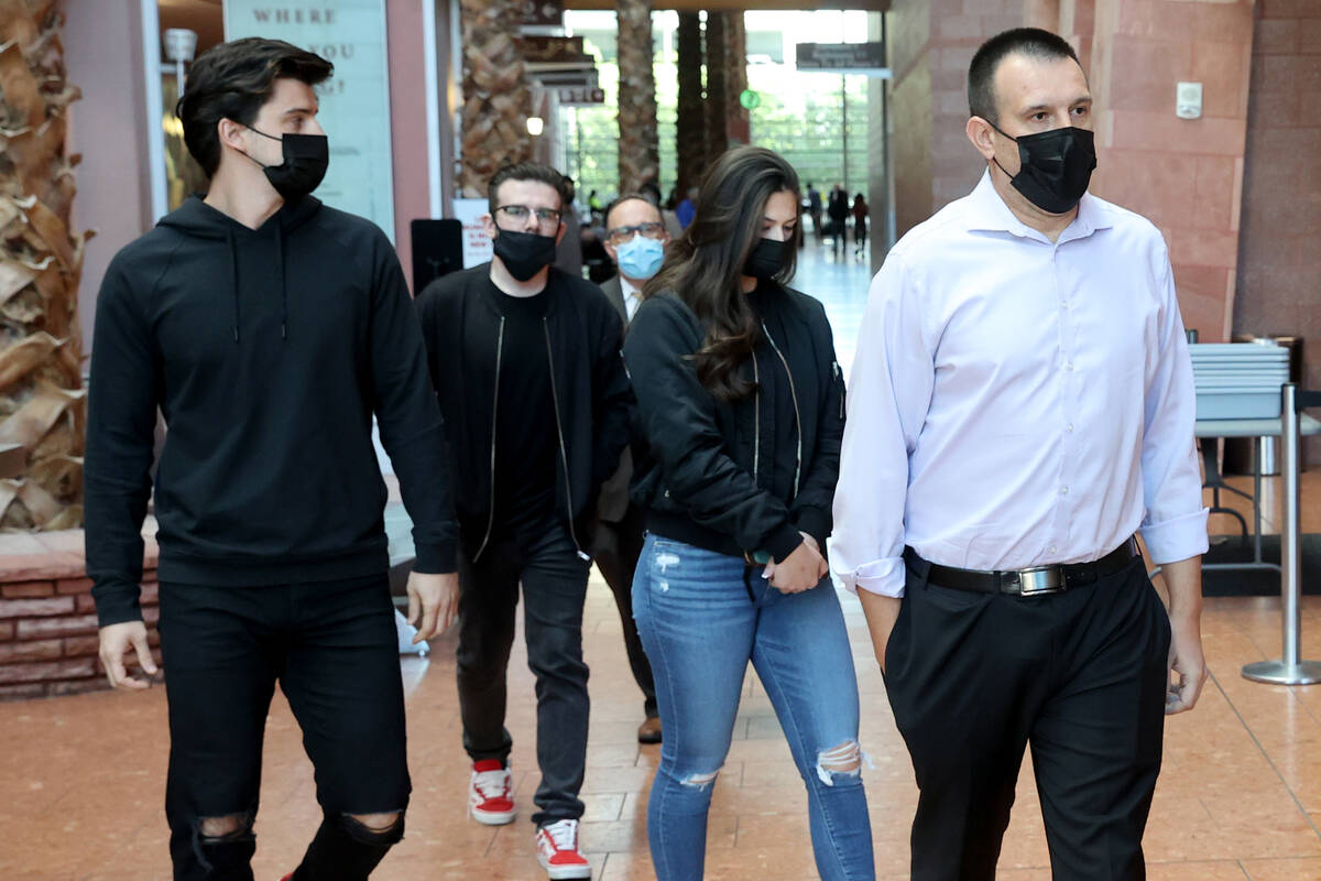 Relatives of Tina Tintor walk out of the Regional Justice Center in Las Vegas on Wednesday, Nov ...