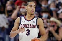 Gonzaga guard Andrew Nembhard controls the ball during the first half of a college basketball e ...