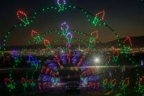 Cars tour through Glittering Lights at Las Vegas Motor Speedway in Las Vegas on Monday Nov. 30, ...
